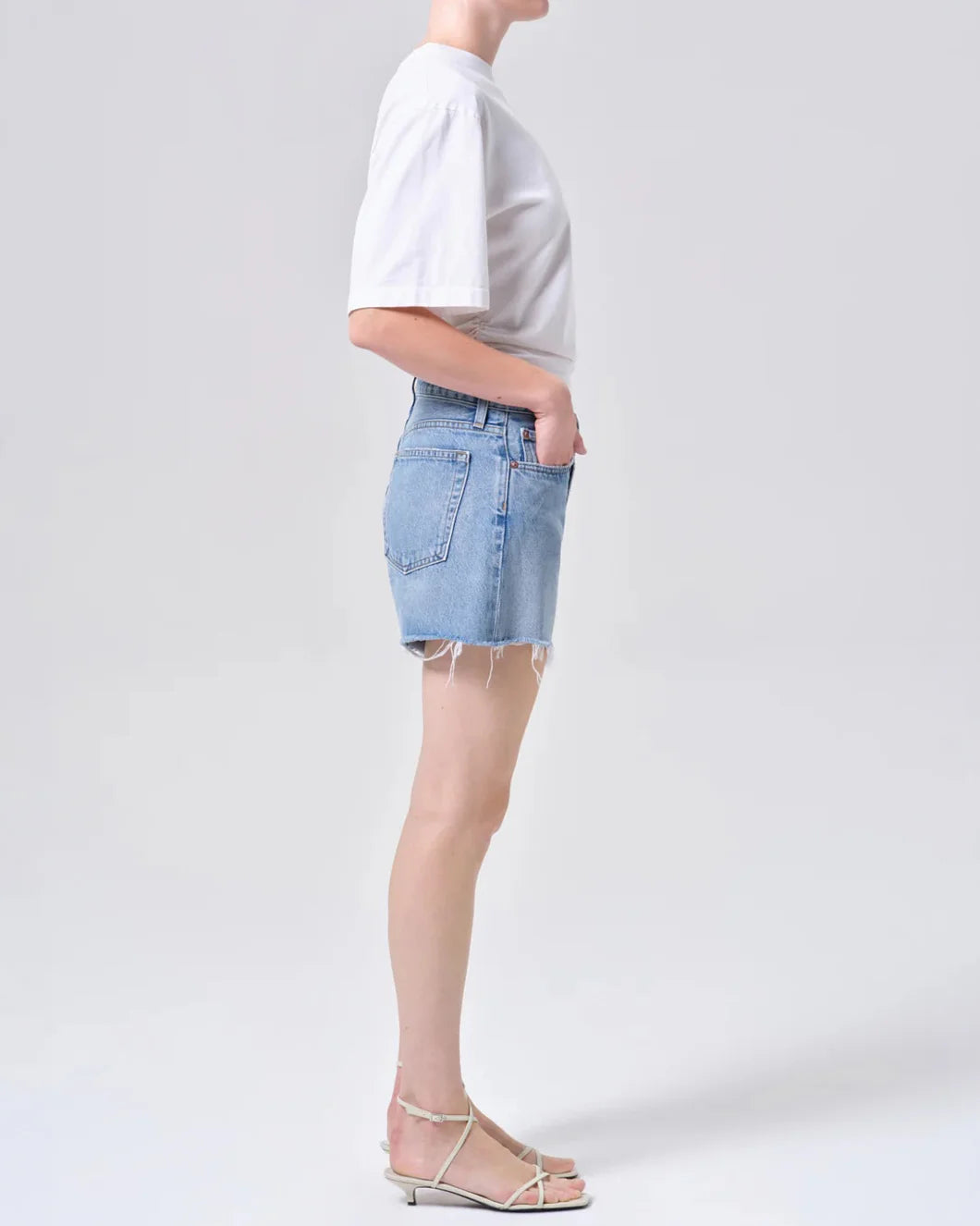 AGOLDE Parker shorts in community on figure side