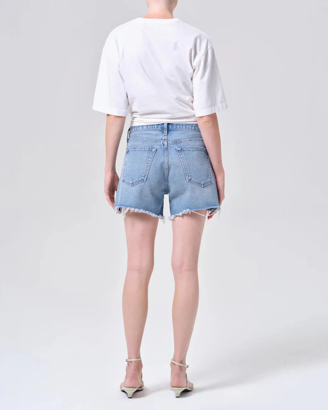 AGOLDE Parker shorts in community on figure back