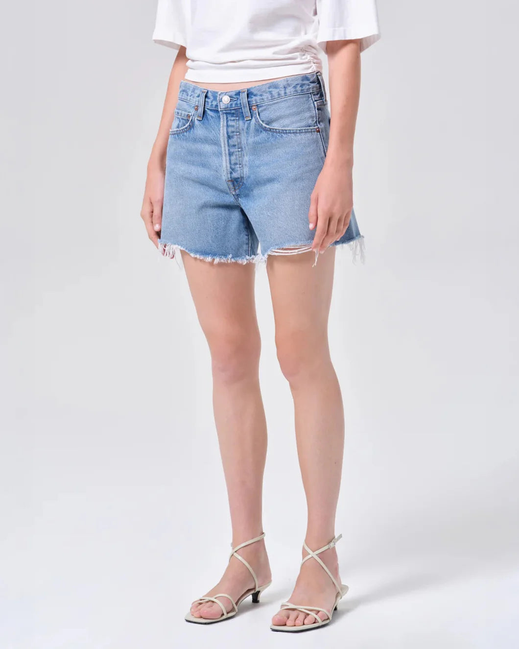 AGOLDE Parker shorts in community on figure front 1