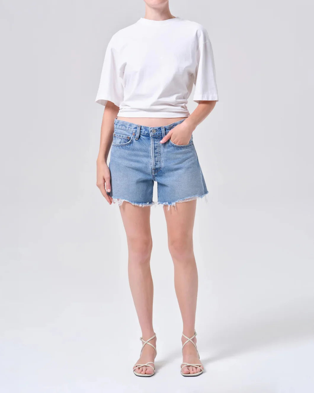 AGOLDE Parker shorts in community on figure front