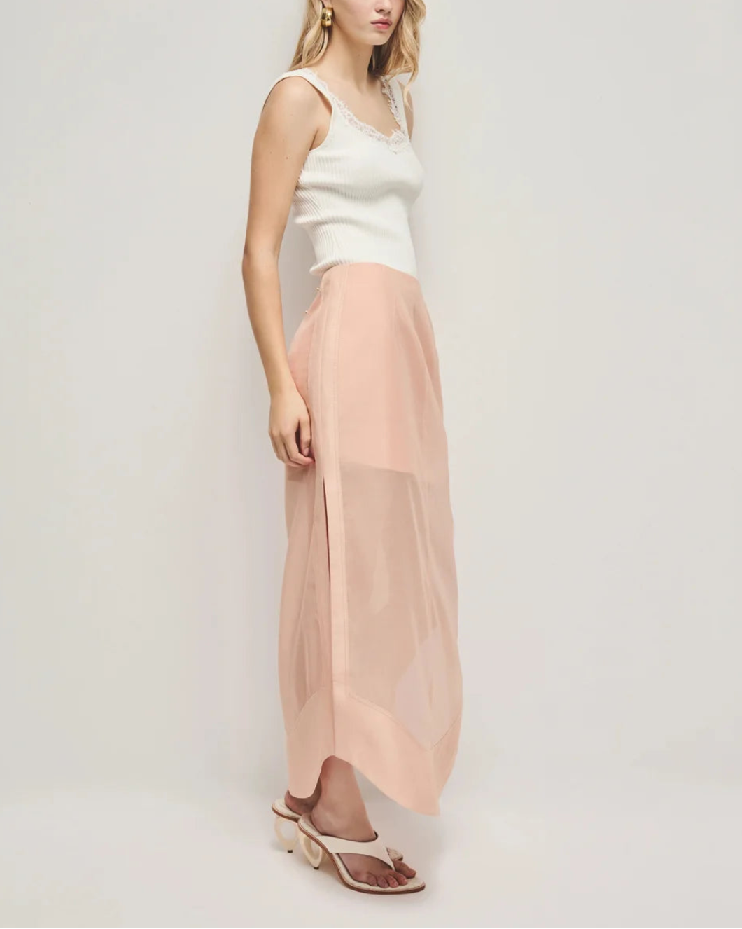 AJE Capture Skirt pink on figure side