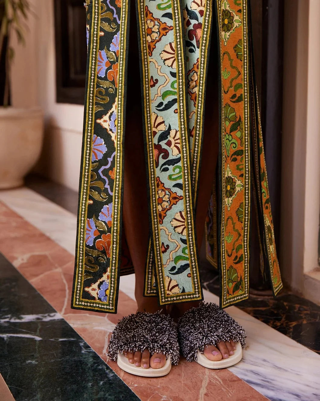 ALEMAIS cece spliced midi dress green hem detail