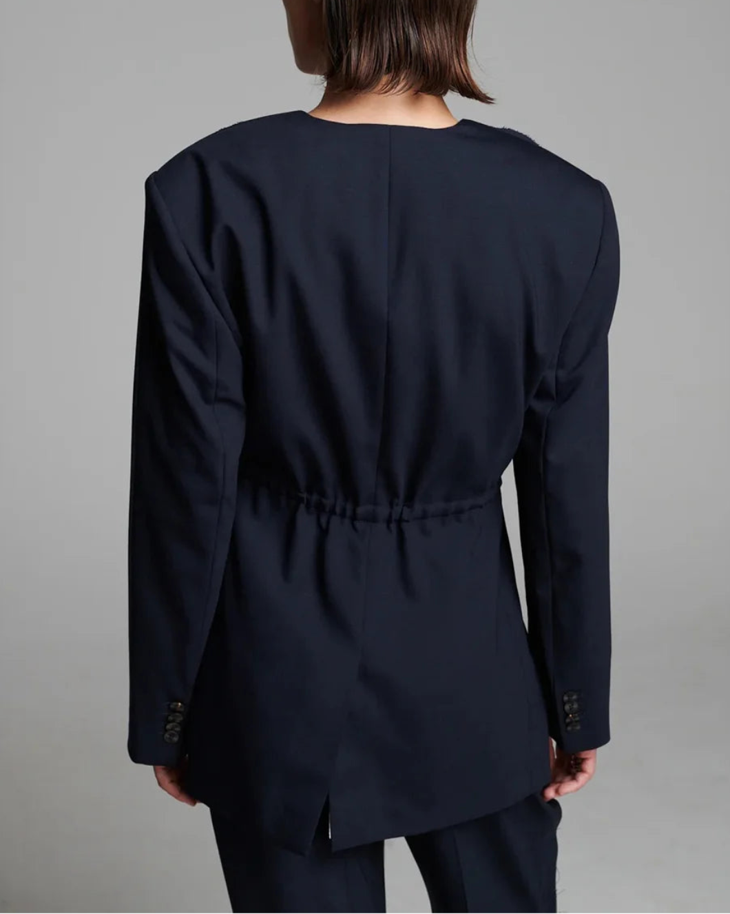 FRENKEN Cord Waisted Jacket Navy on figure back 1