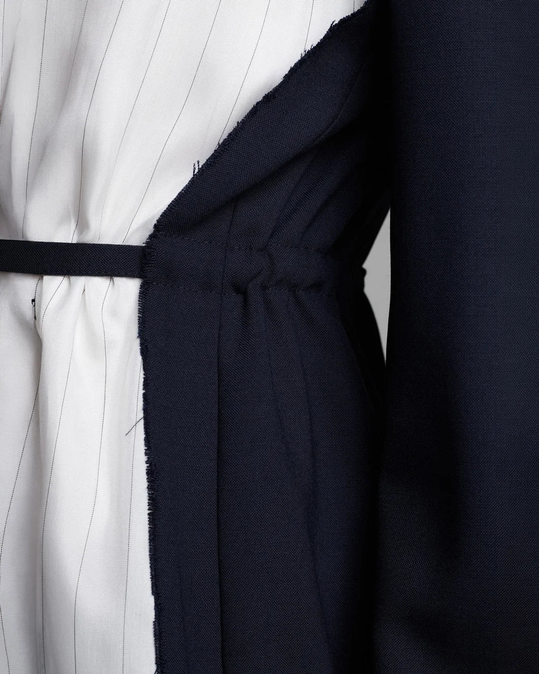 FRENKEN Cord Waisted Jacket Navy on figure front detail