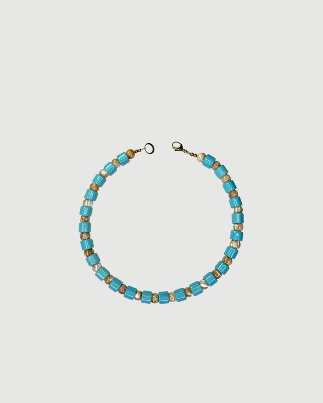 HER NEW TRIBE Pool & Conch Mother of Pearl Sundry Bead One Necklace isolated