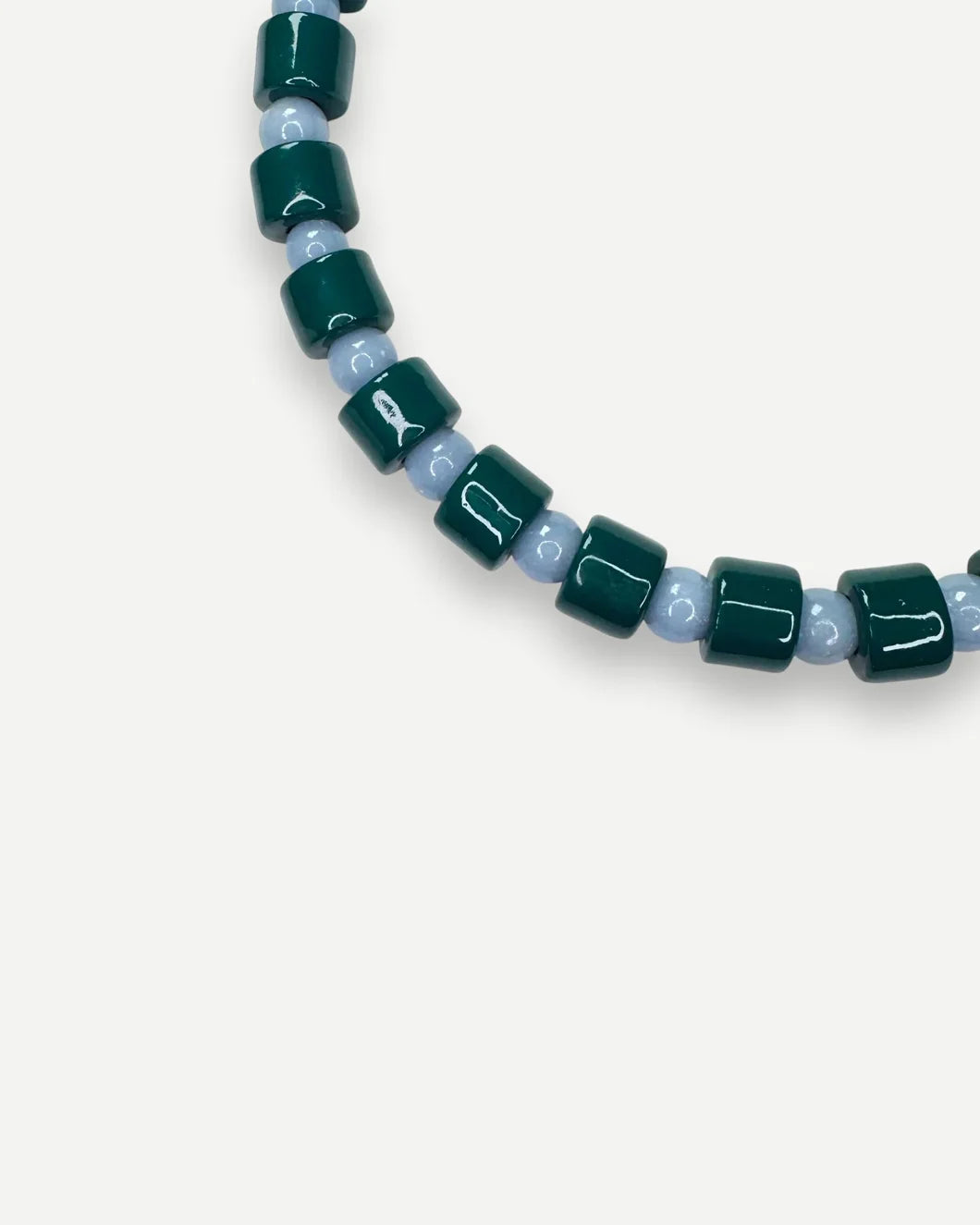 HER NEW TRIBE bottle and blue lace agate sundry bead necklace detail