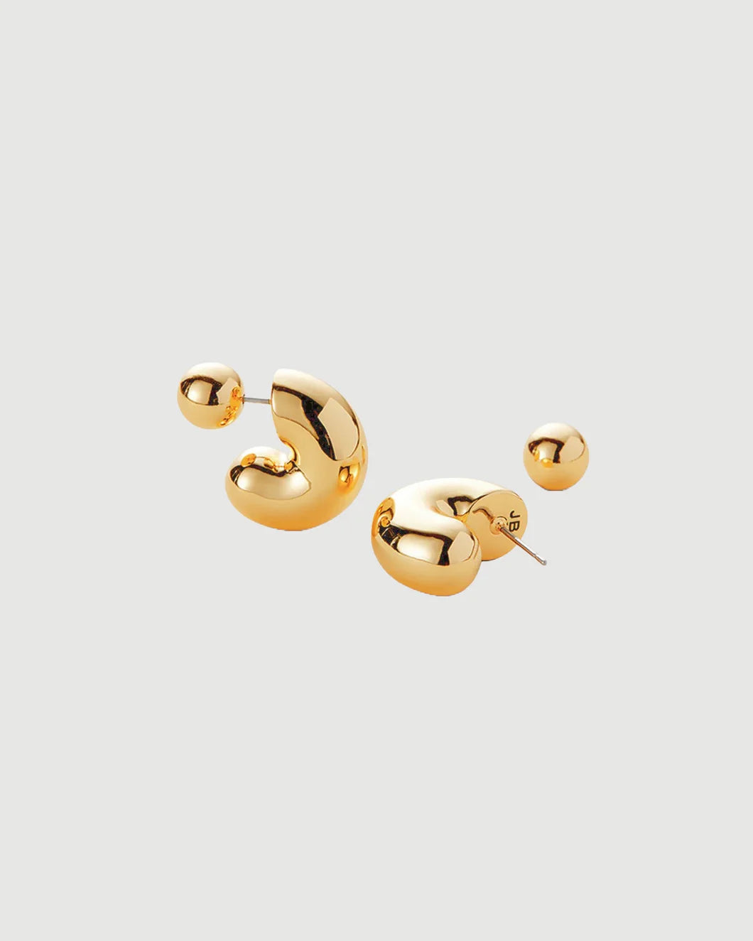 JENNY BIRD tome hoops medium gold isolated