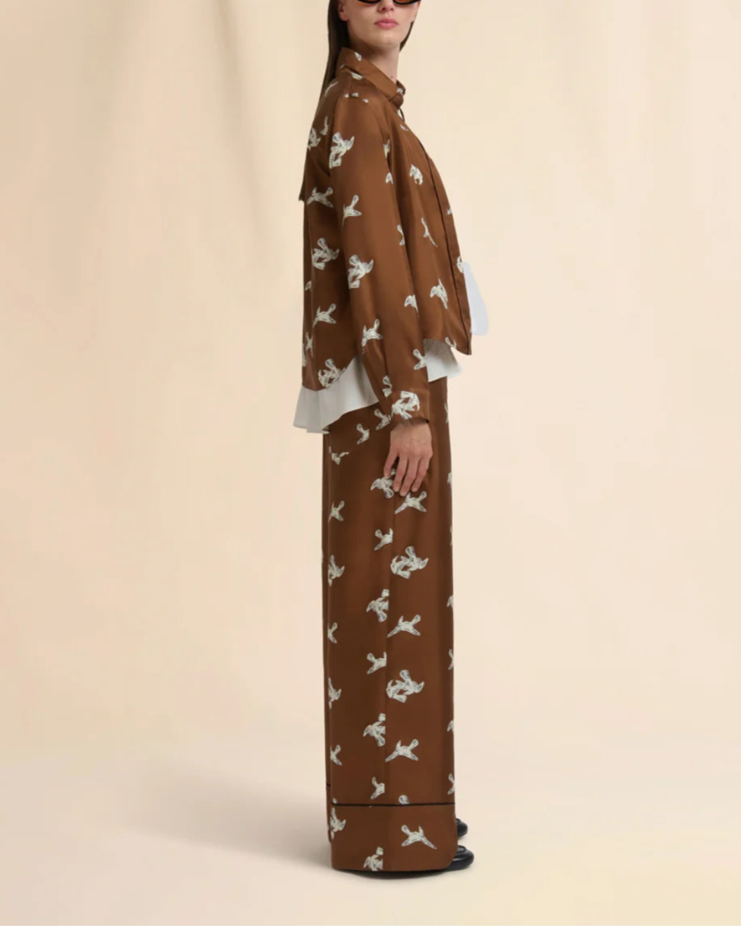 MARNI raven print wide leg trousers brown on figure side
