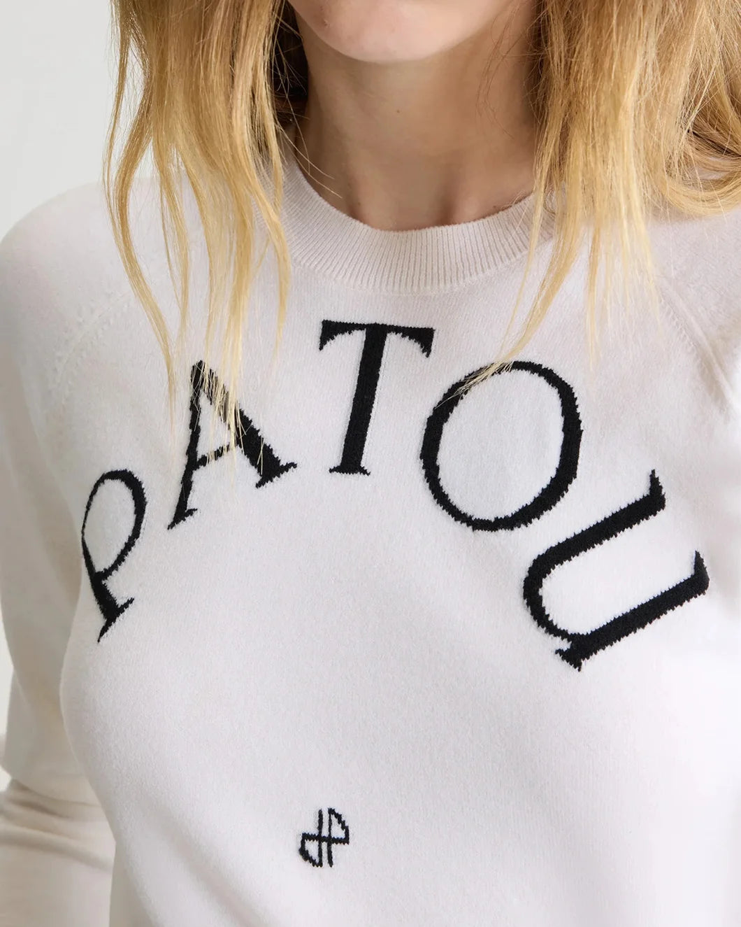 patou white wool blend long sleeve jumper sweater on model front detail view