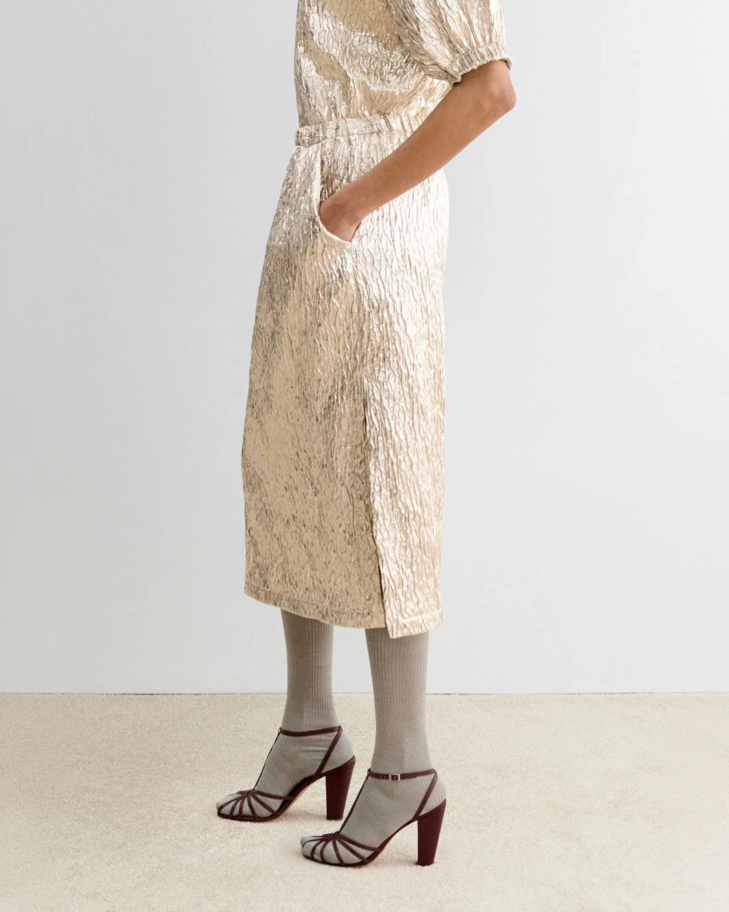 RACHEL COMEY Mott Skirt champagne on figure side