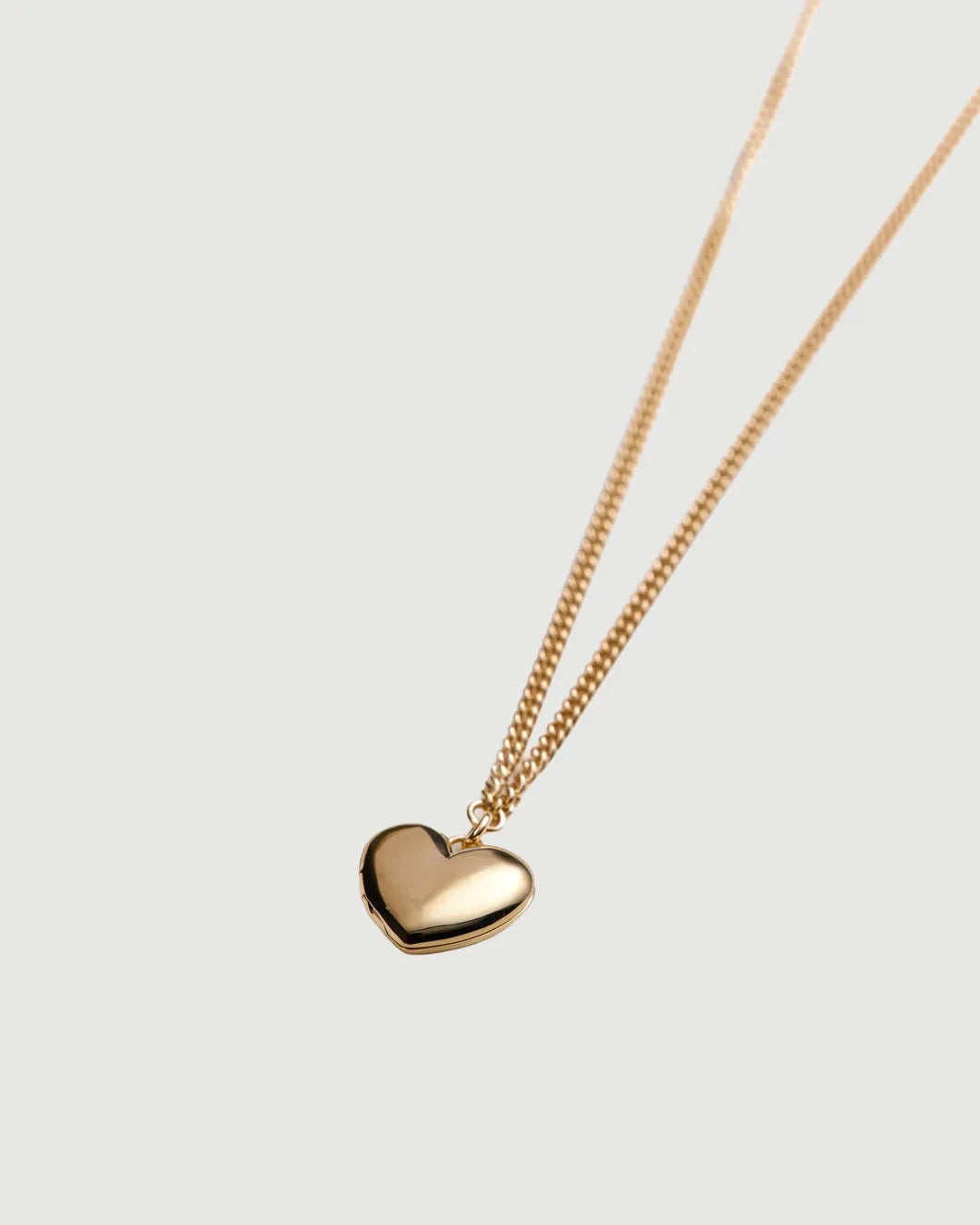 THEIR bowie heart locket gold isolated