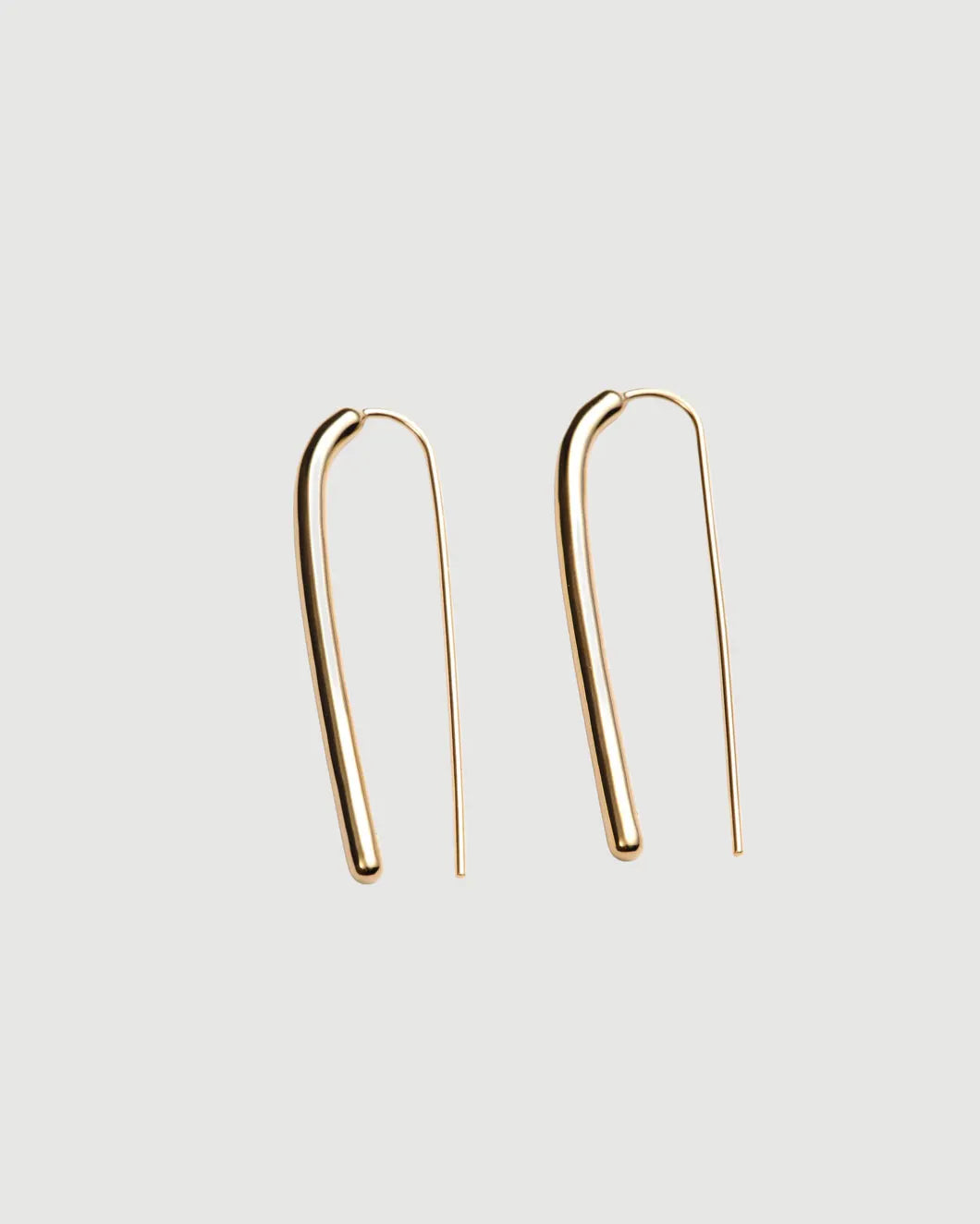 THEIR mini pin earrings gold isolated