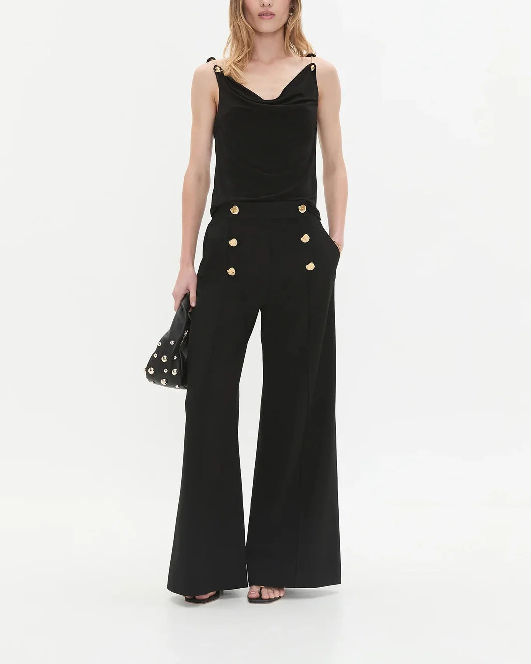 aje Gabrielle Pant black with gold button detail on model front styled