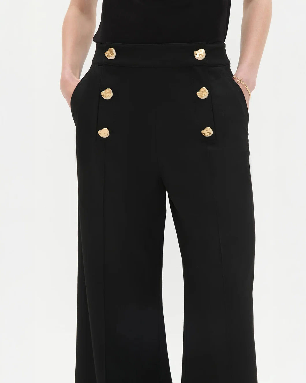 aje Gabrielle Pant black with gold button detail on model front detail