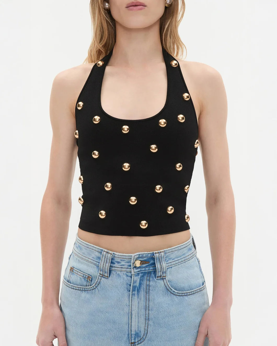aje black Leah Knit Halter Top with gold button detail on model front view