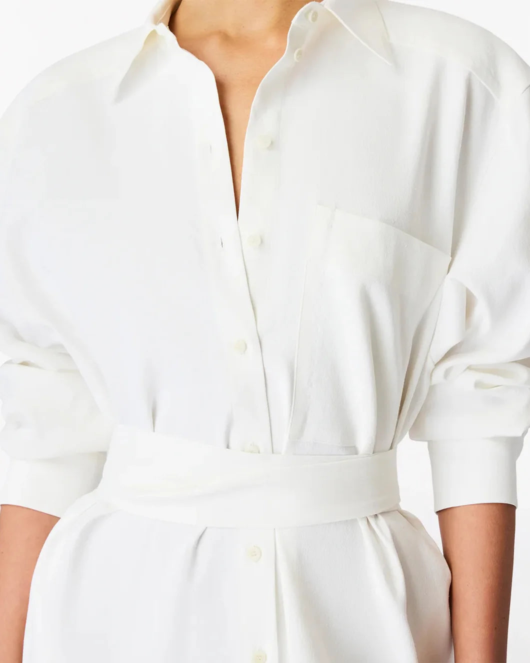 White dress with a belt on a white background