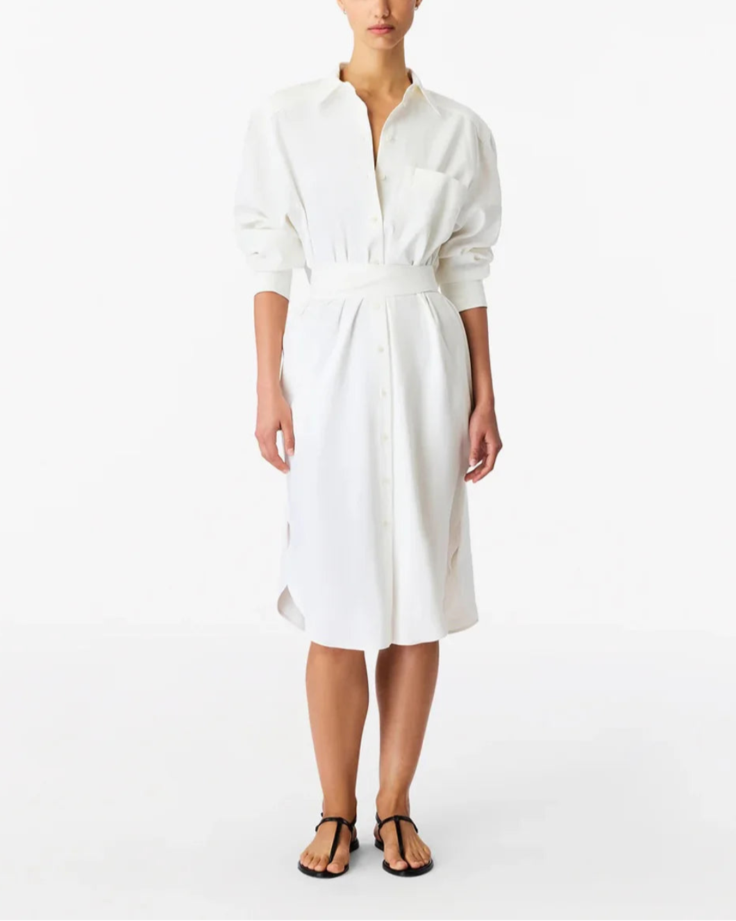 Woman wearing a white dress on a white background