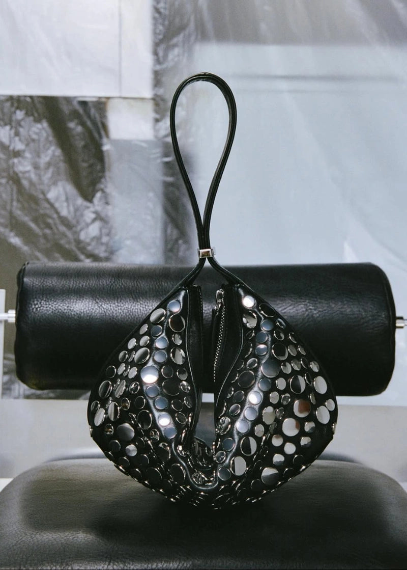 Black handbag with decorative studs