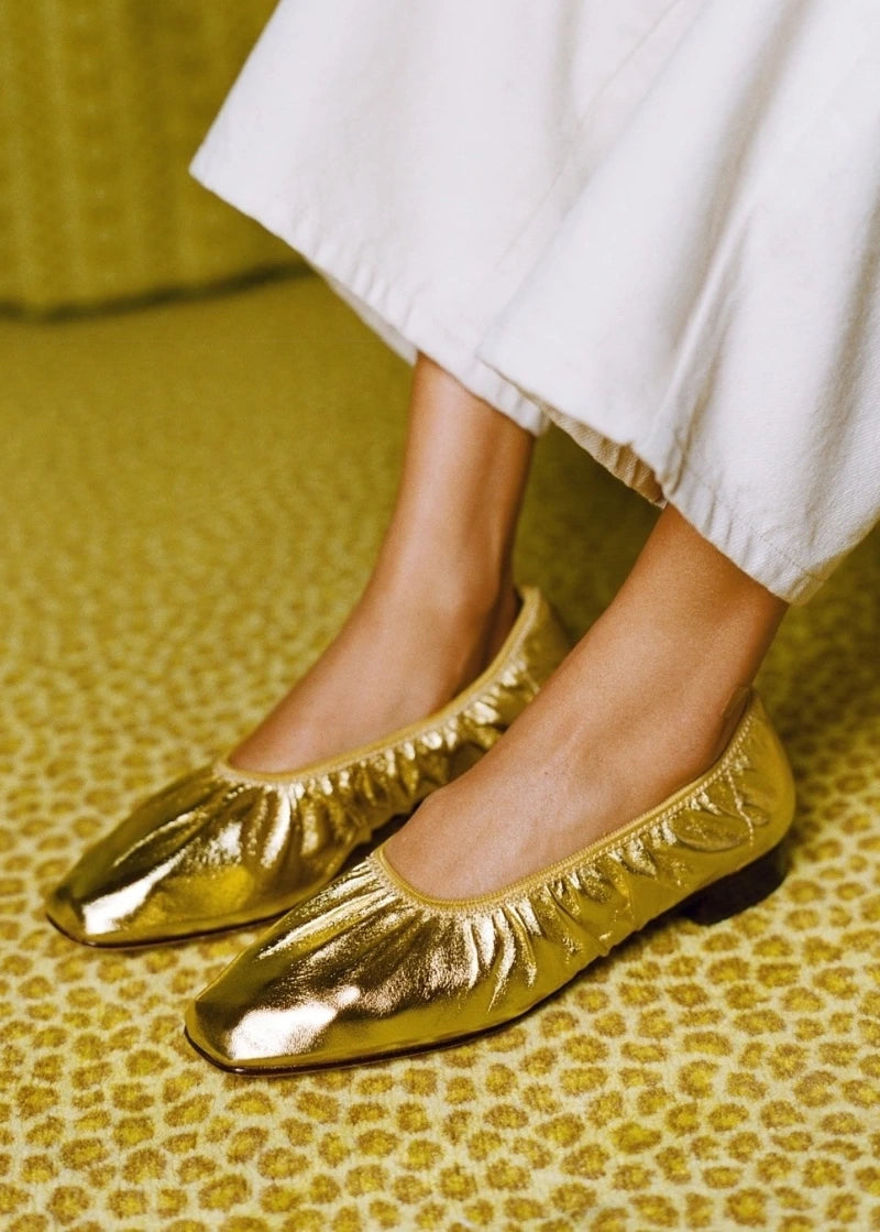 gold ballet flats