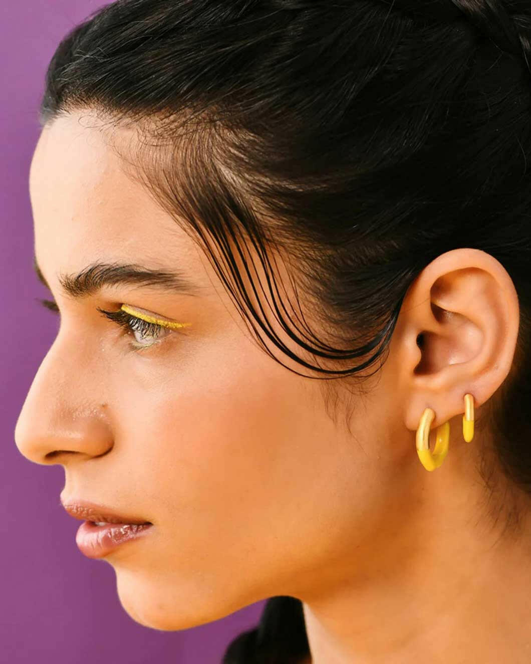 lunaya jewelry mini molten hoops neon yellow on figure