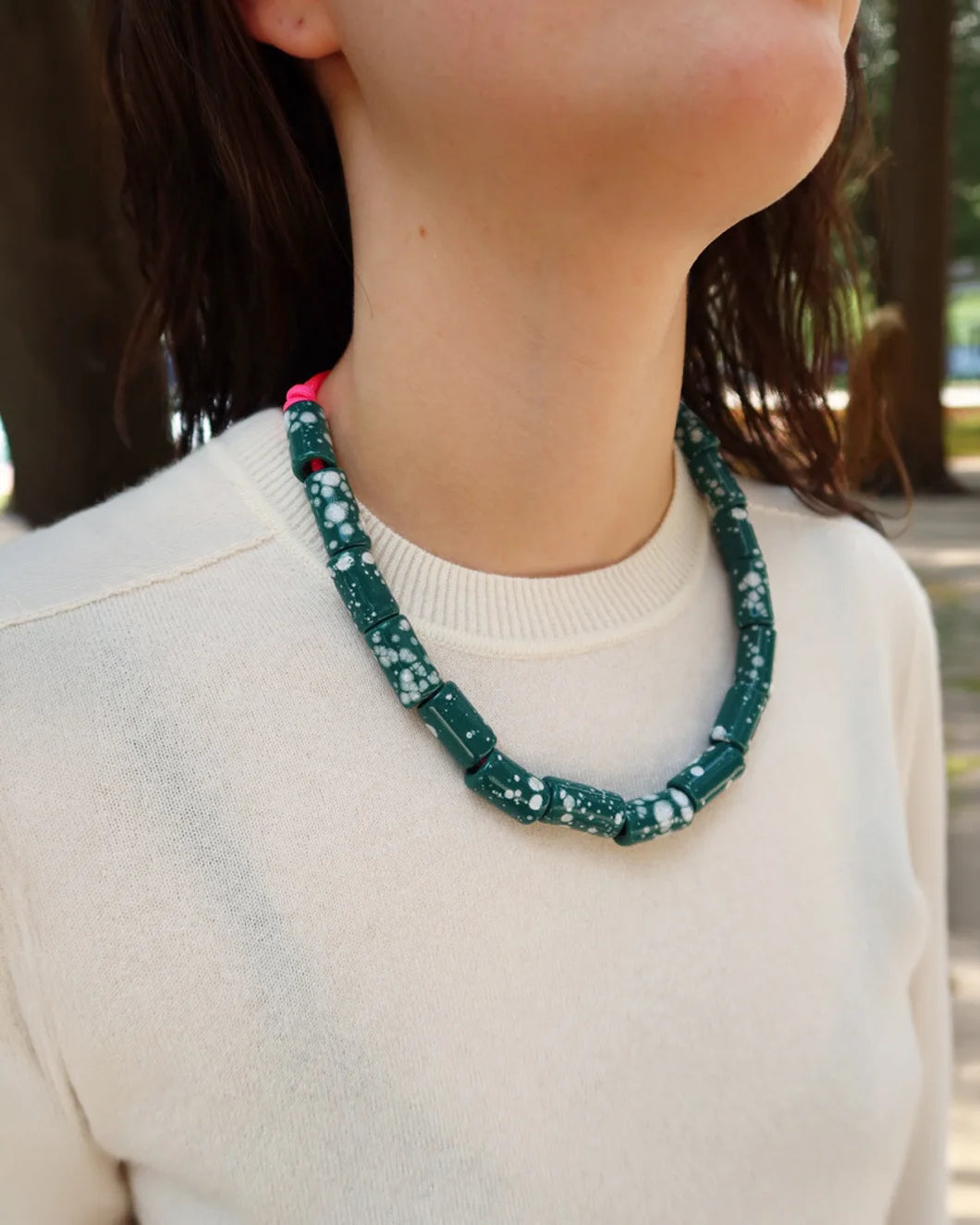 HER NEW TRIBE Melt Candy Bead Four Necklace on figure side