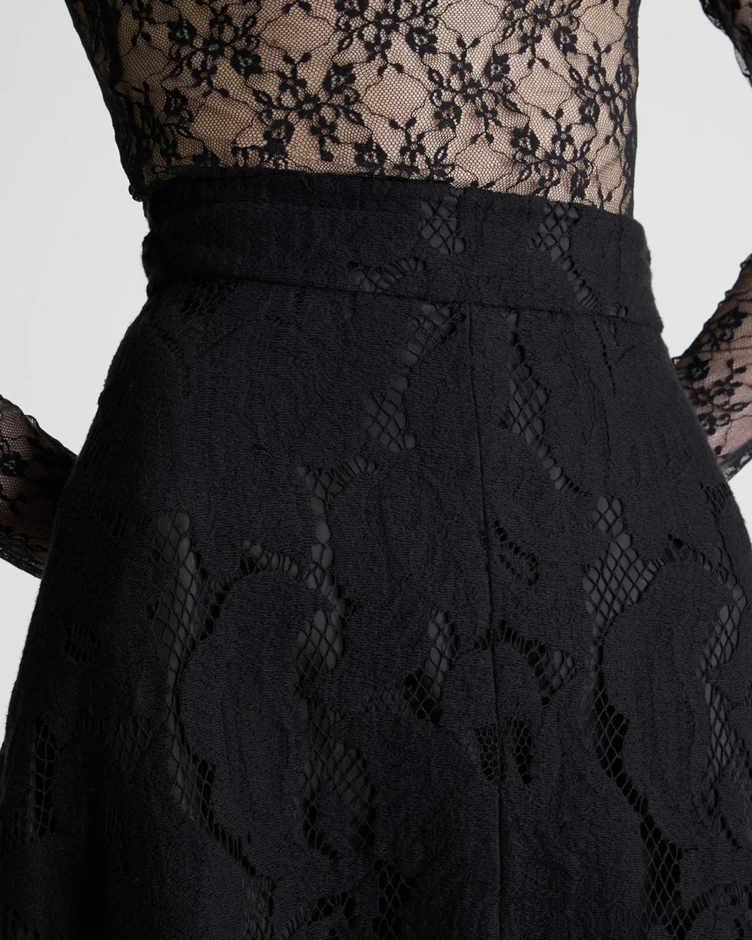 patou black asymmetric midi skirt in organic cotton blend lace on model waist detail view