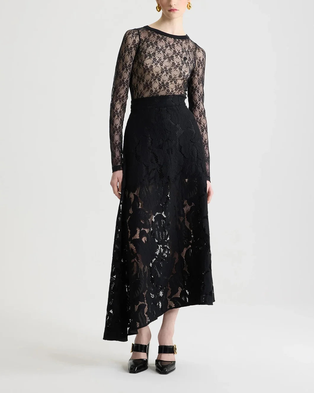 patou black asymmetric midi skirt in organic cotton blend lace on model front view