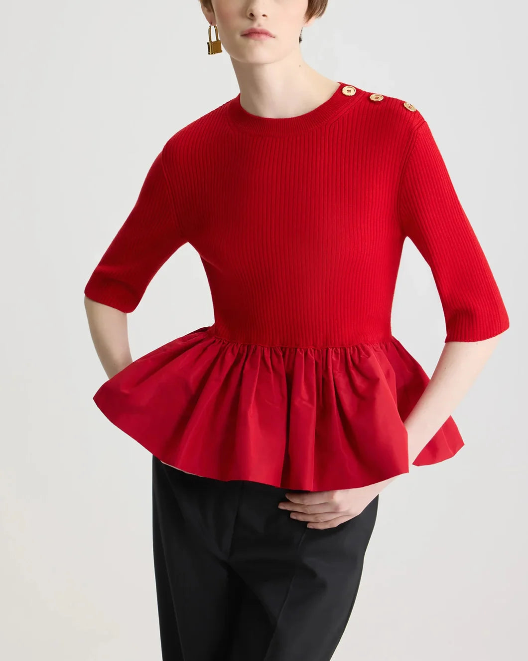 patou Ruffle Hem Ribbed Jumper in Wool and Faille in elixir red on model front close up view