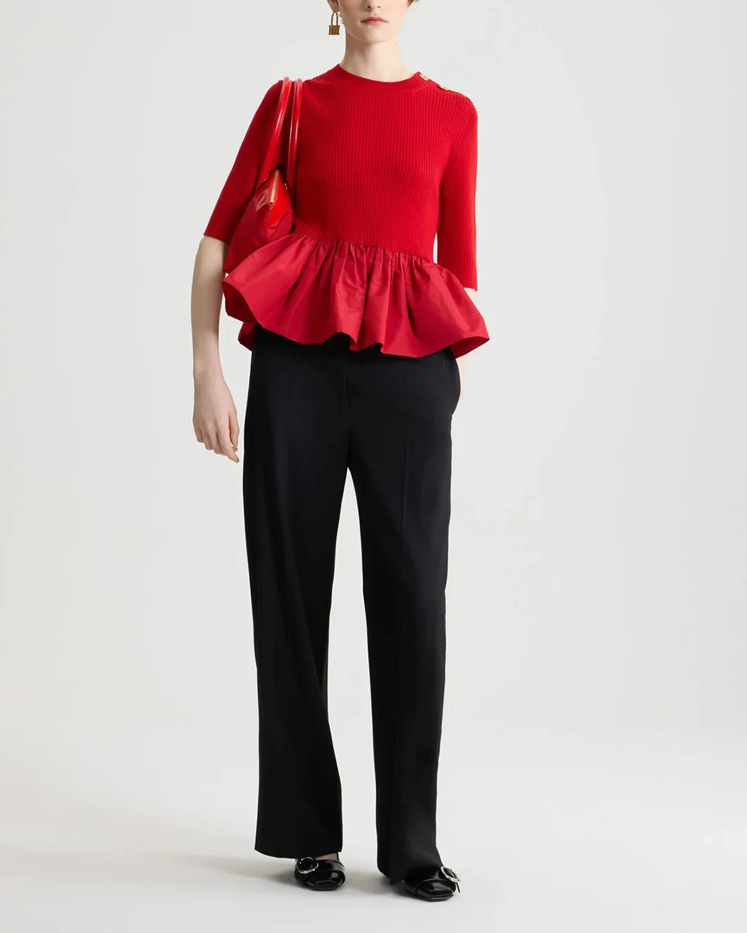 patou Ruffle Hem Ribbed Jumper in Wool and Faille in elixir red on model front view