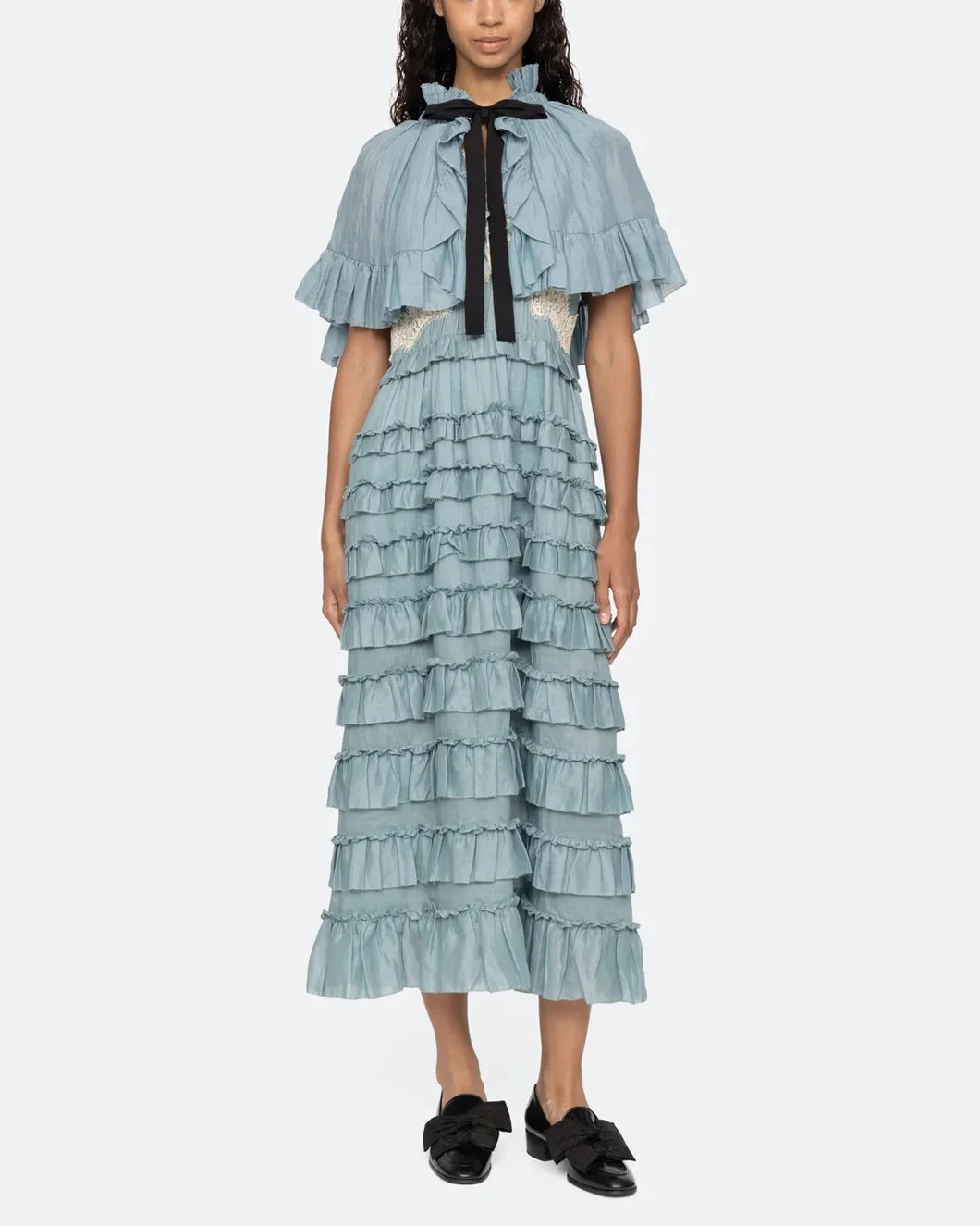 sea ny Anise Solid Capelet blue on figure front with anise blue dress