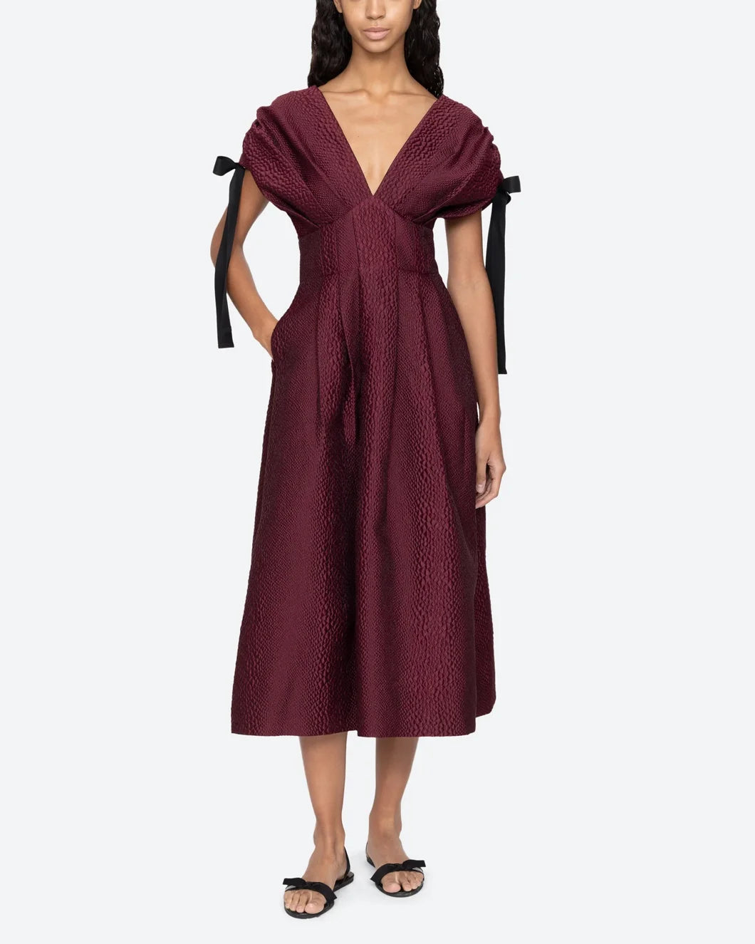 sea ny Fayetta Midi Dress embossed burgundy on model front view pocket detail