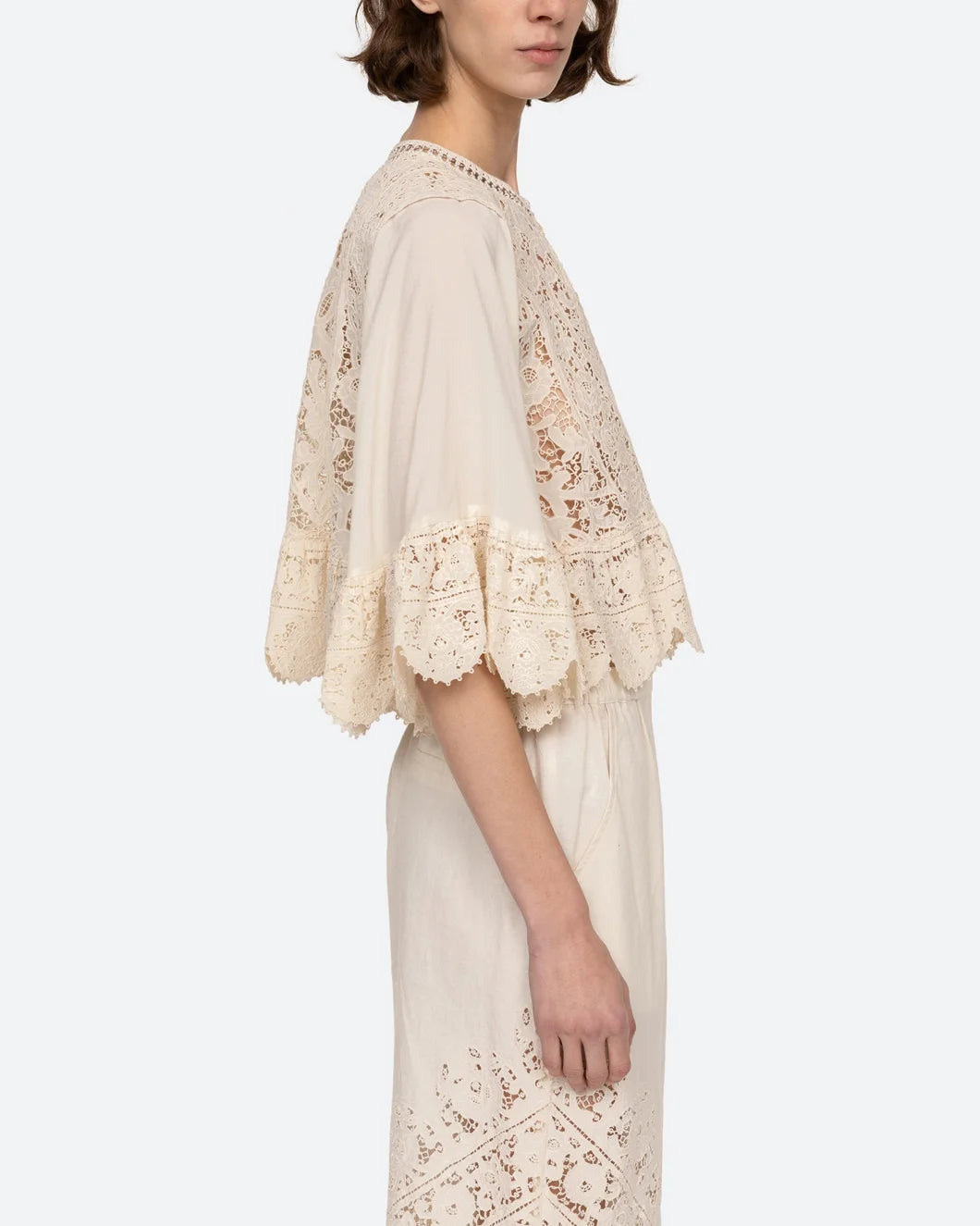 sea ny shanna lace three quarter sleeve scallop hem top in cream on model right side view