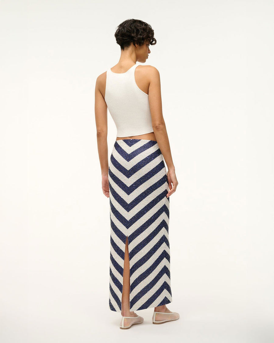 staud st tropez skirt on the horizon onth blue and white on model back