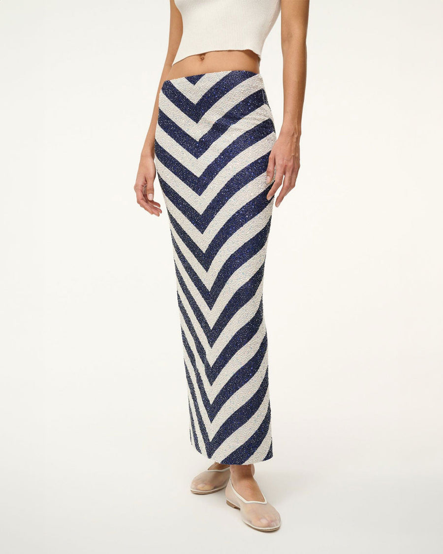 staud st tropez skirt on the horizon onth blue and white on model front