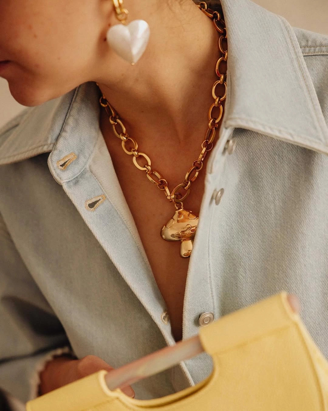 timeless pearly Gold Chain With Mushroom Charm on figure