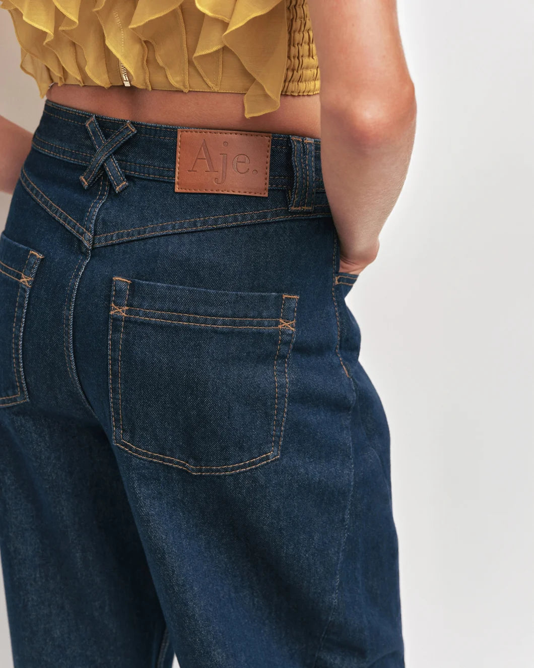 AJE stevie barrel ankle jean dark wash on figure back detail