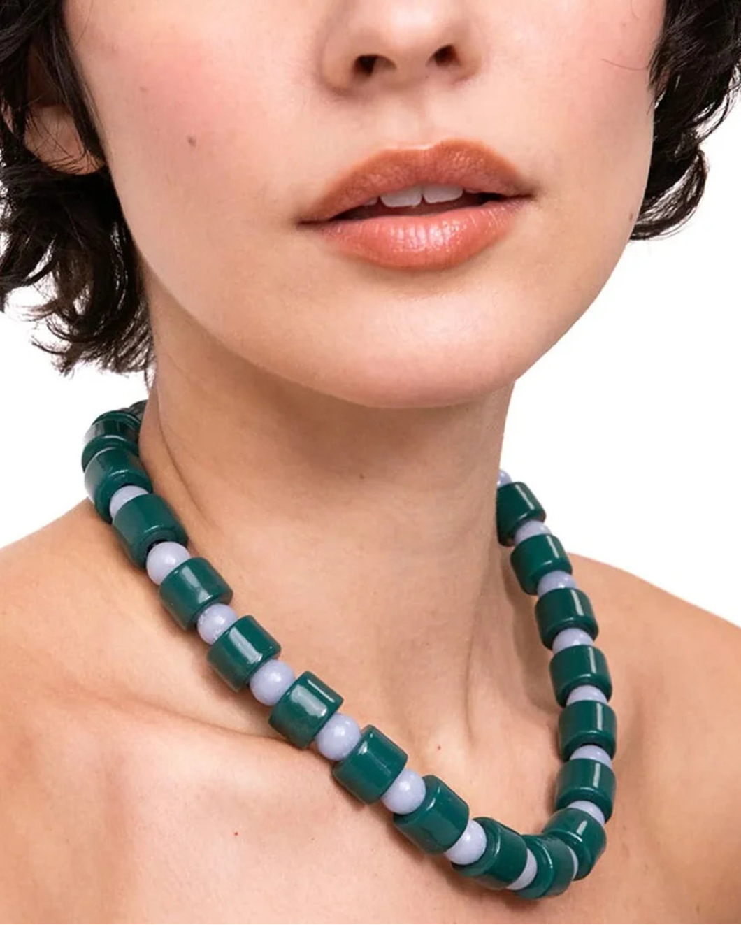 HER NEW TRIBE bottle and blue lace agate sundry bead necklace on figure