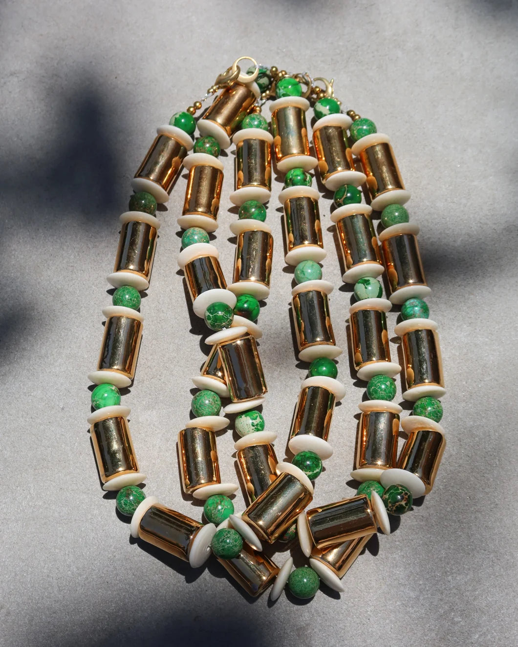 HER NEW TRIBE karat and sea sediment stacked necklace