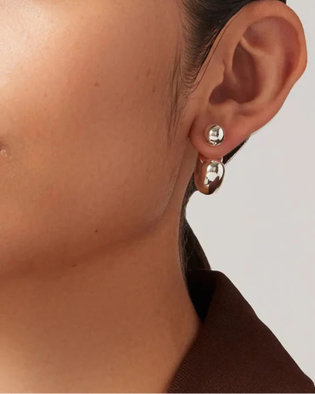 JENNY BIRD tome hoop earrings silver on figure front