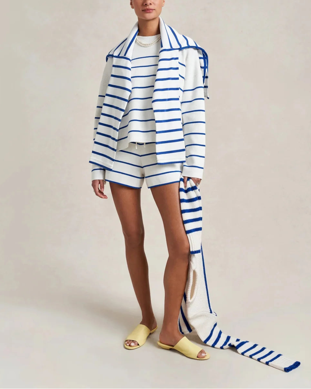 LA LIGNE Leo Sweater Cream/Cobalt on figure front 2