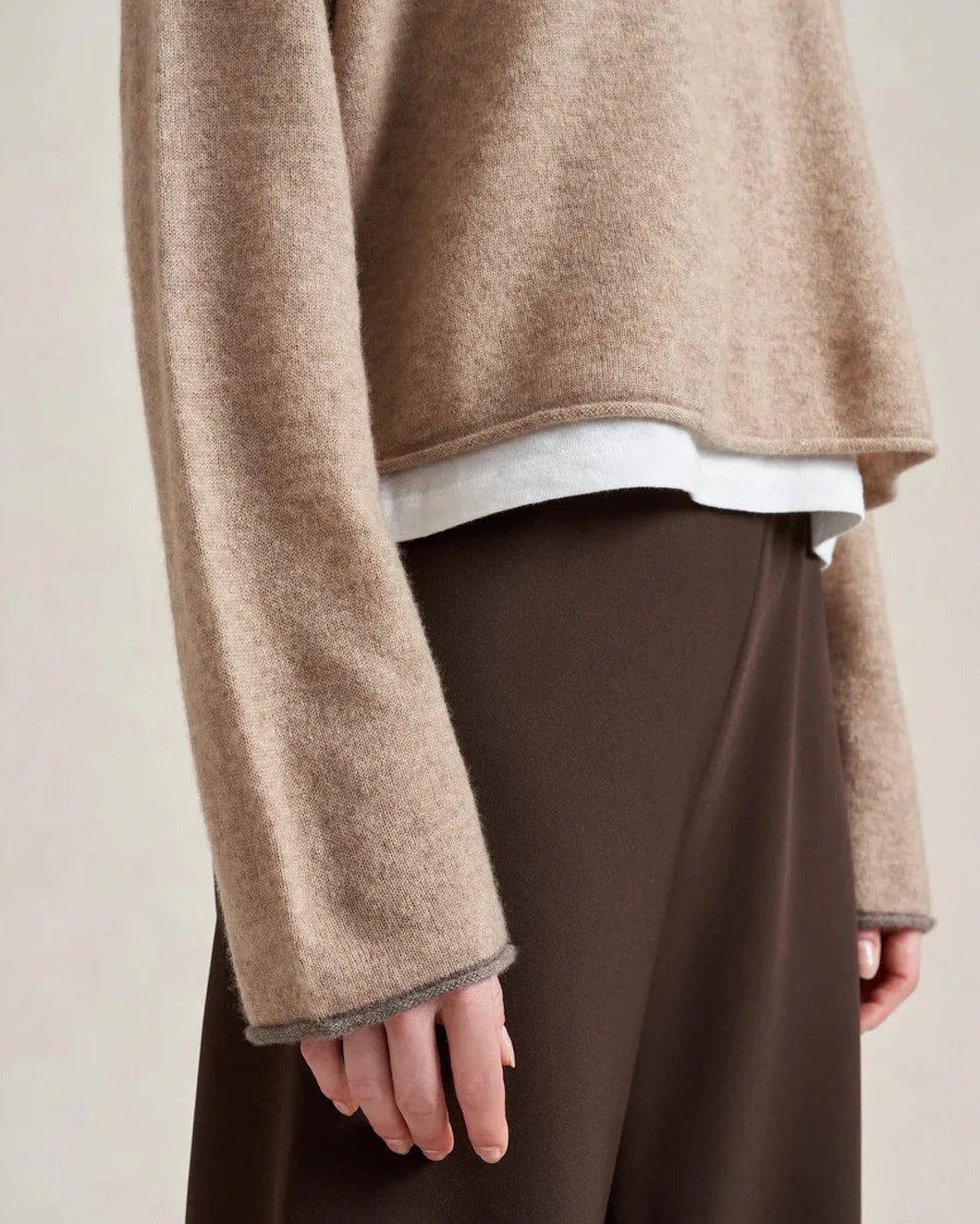LA LIGNE dominic sweater in tan /dark tan on figure side detail