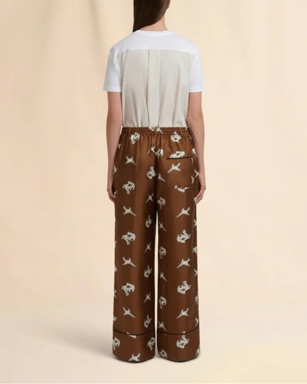 MARNI raven print wide leg trousers brown on figure back