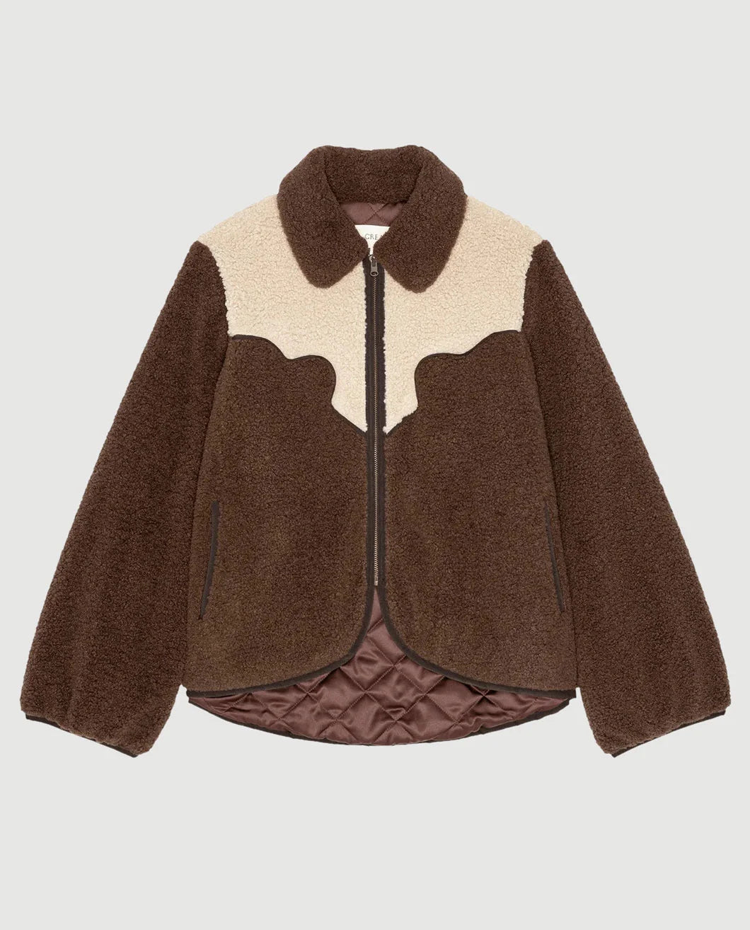 THE GREAT The Reversible Western Yoke Pasture Jacket isolated