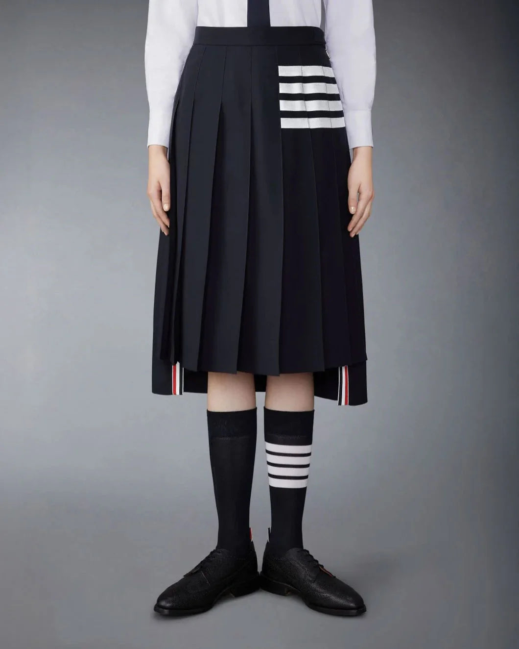 Thom Browne Below Knee Dropped Back Pleated Skirt | SHOWROOM Thom Browne Below Knee Dropped Back Pleated Skirt | SHOWROOM