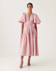 aje fallingwater ruched midi dress chalk pink dress on figure front
