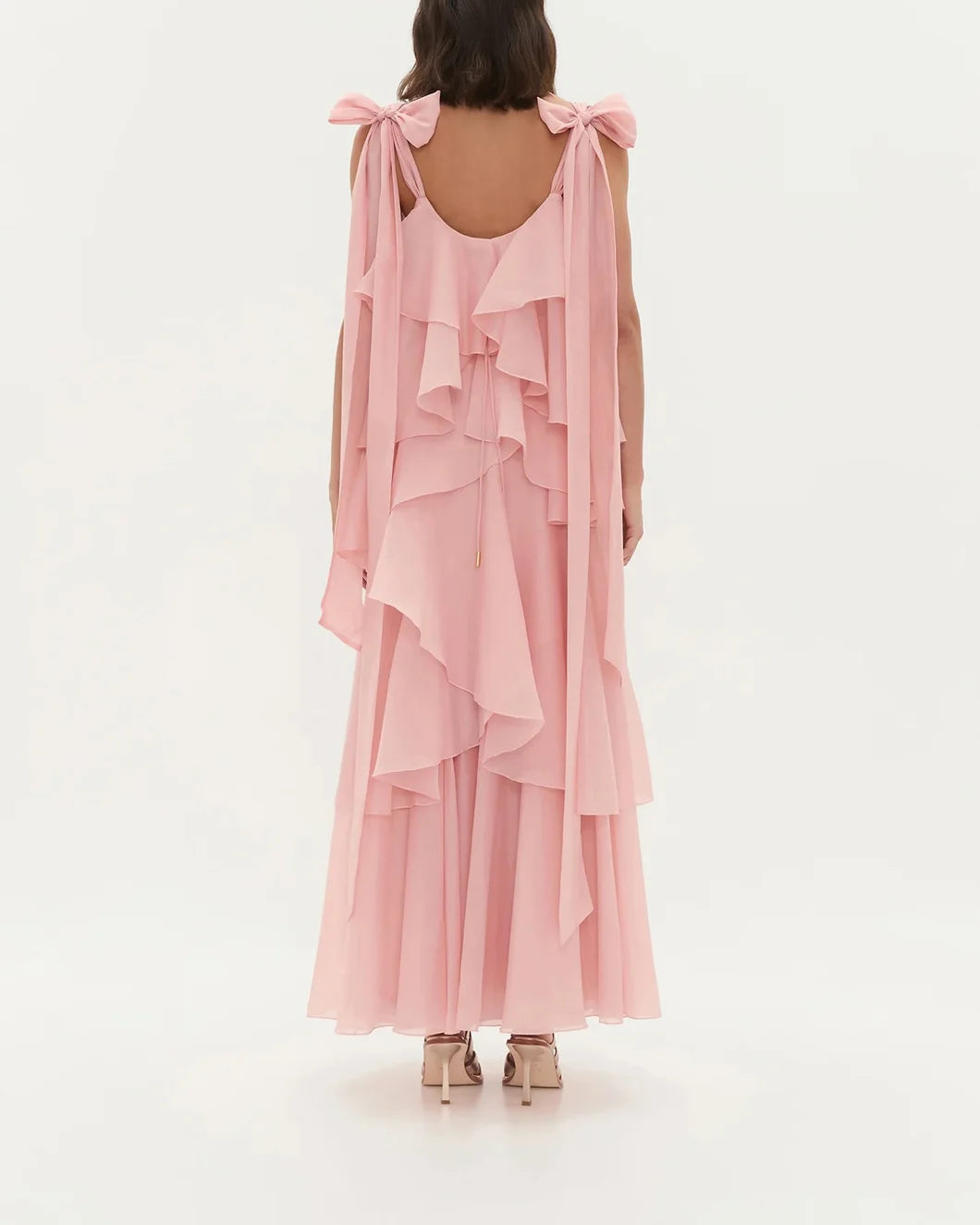 aje Gracie Maxi tiered ruffle Dress in muted rose pink on model back view