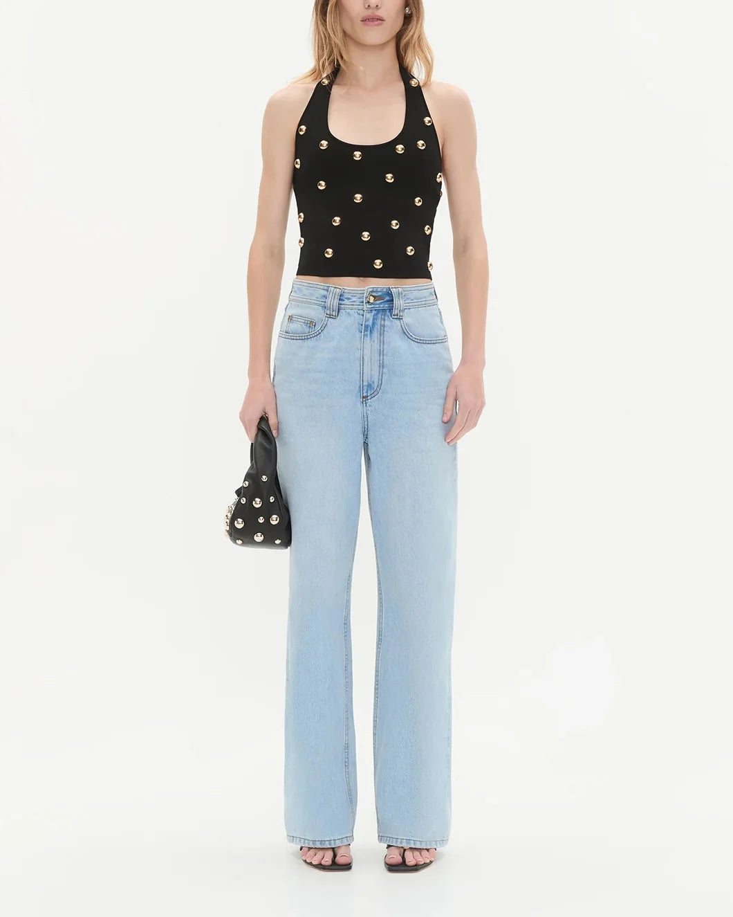 aje black Leah Knit Halter Top with gold button detail on model front view full length