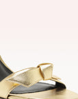 alexandre birman clarita bell 85 metallic gold sandal isolated detail