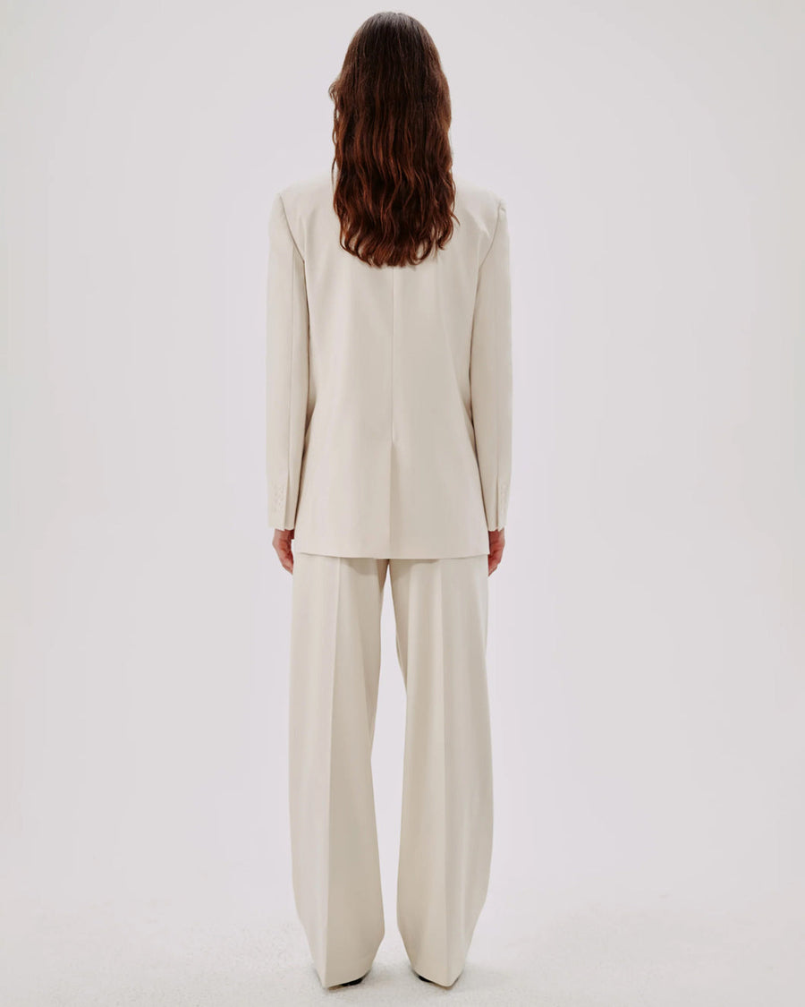 another tomorrow oversized blazer and relaxed wide leg pants parchment blazer and pants on figure back
