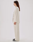 another tomorrow oversized blazer and relaxed wide leg pants parchment blazer and pants on figure side